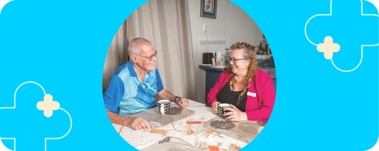 Woman socialising with her elderly father