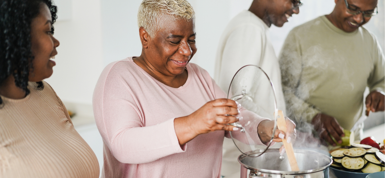 Women cooking healthy meals as part of diabetes home care regimen