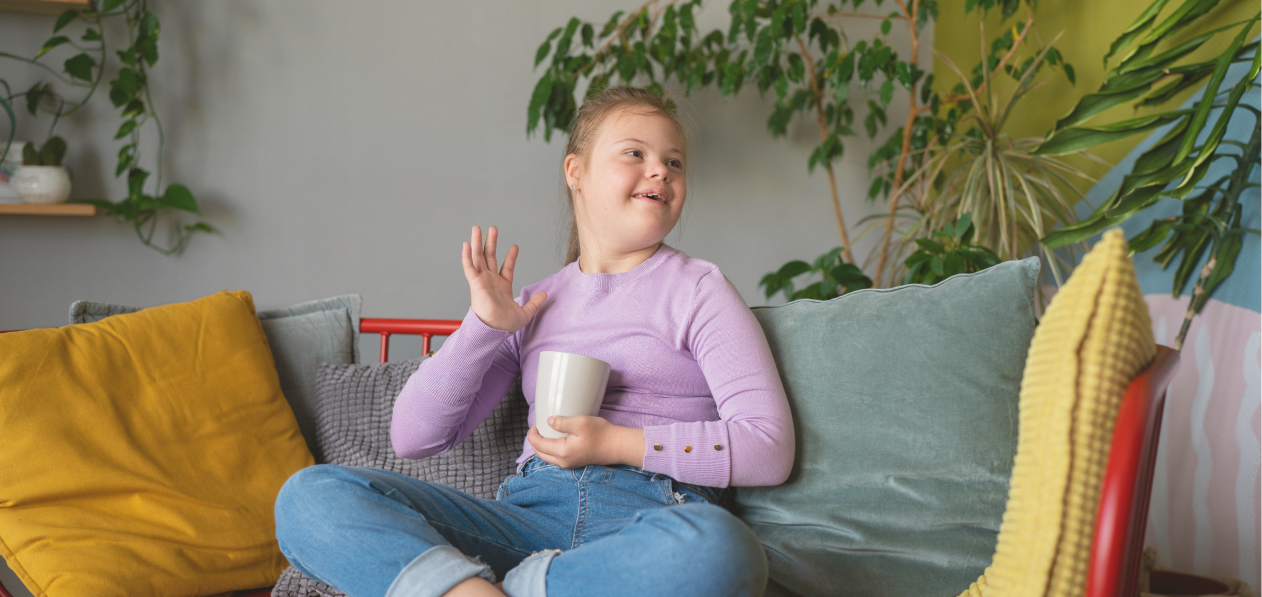 Girl with Down syndrome at home