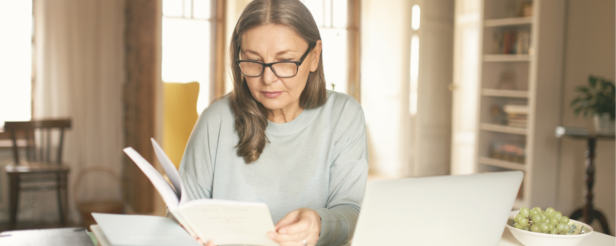 Woman researching NDIS self-managed vs plan managed