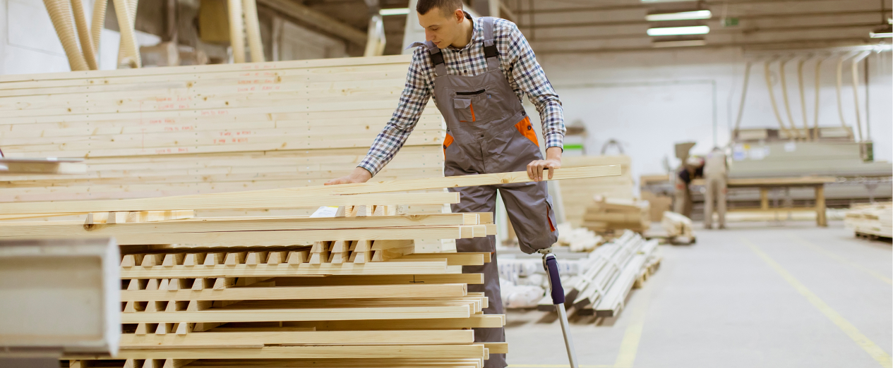 NDIS participant works in a wood shop.