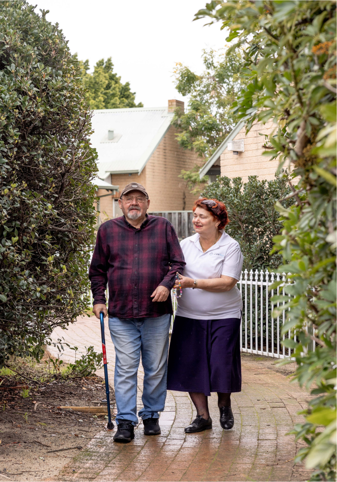 A Perth home care recipient enjoys a walk with his caregiver from The CareSide.