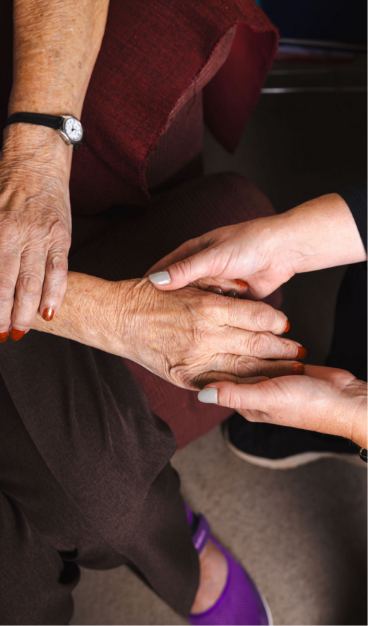 Several hands holding each other as a show of support.